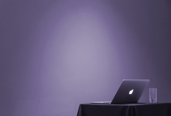 Open laptop on blue background